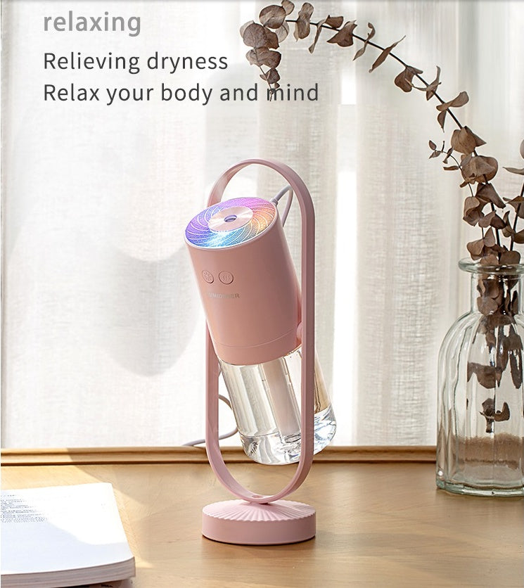 Aurora humidifier producing a dense cool mist