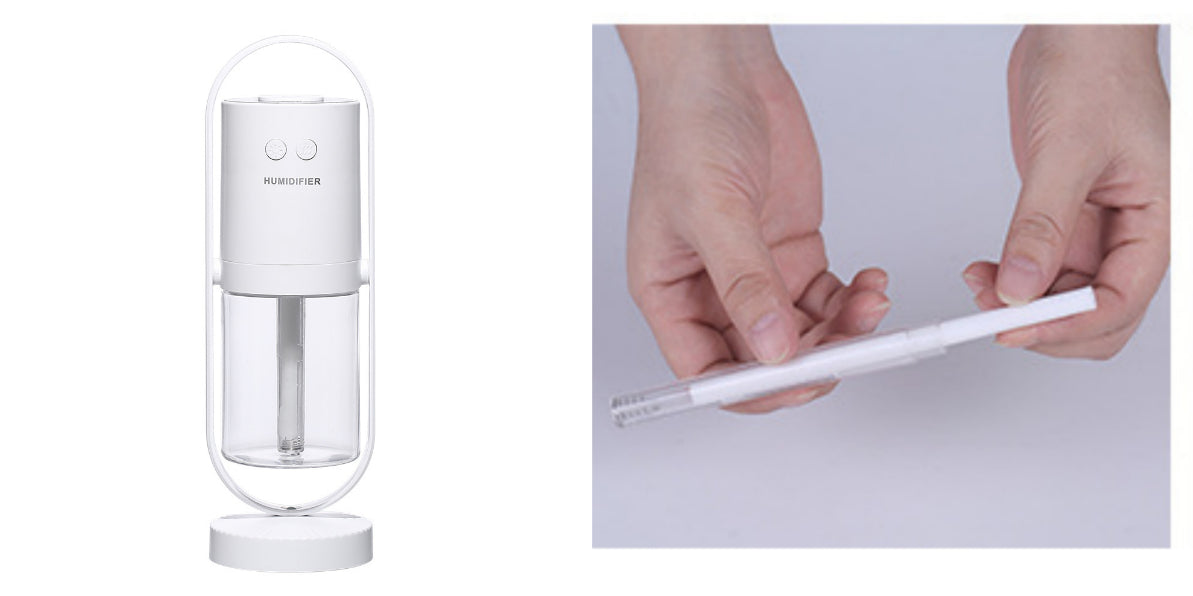Aurora projection humidifier in white, shown with the spare wick