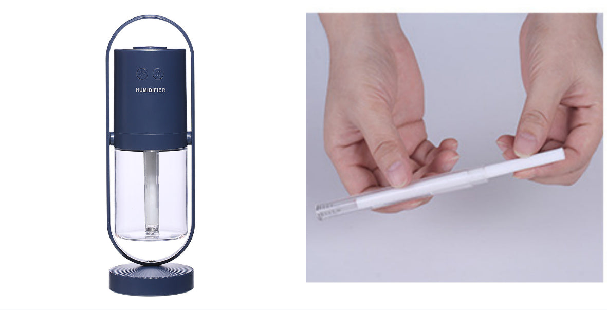 Aurora projection humidifier in dark blue, shown with the spare wick