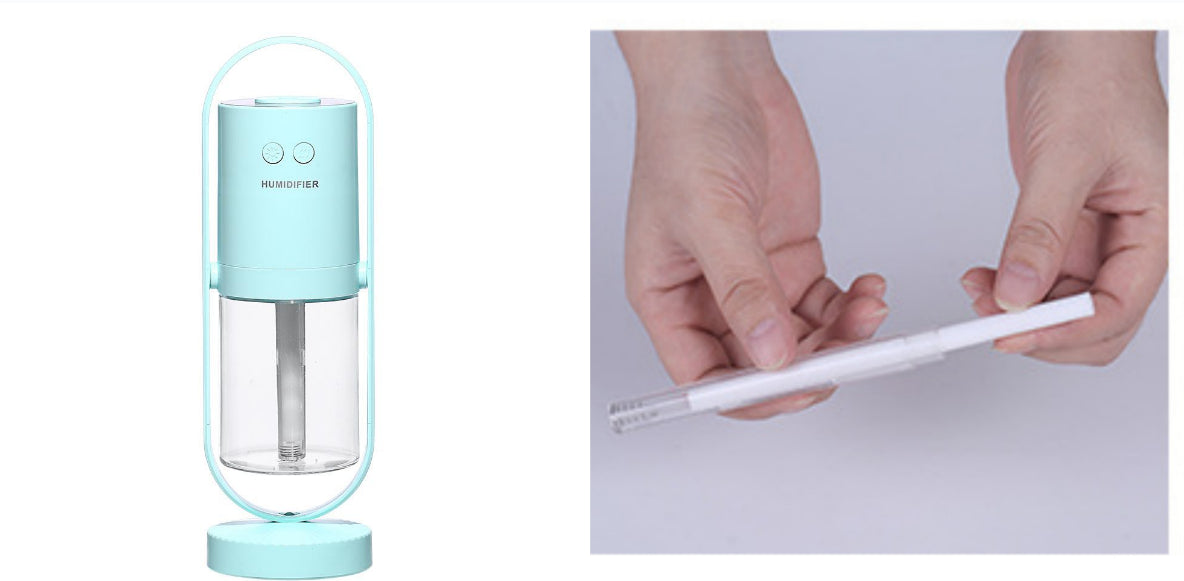 Aurora projection humidifier in blue, shown with the spare wick